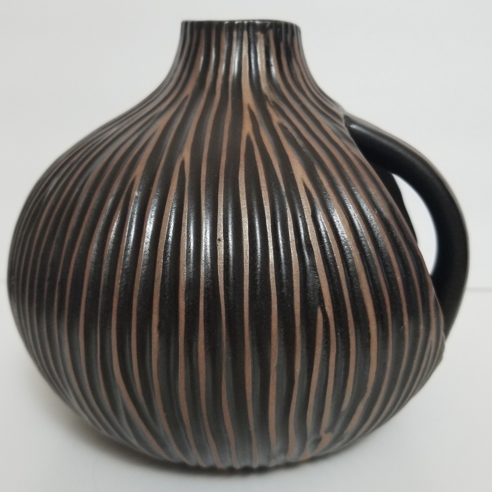 Vintage textured brown jar